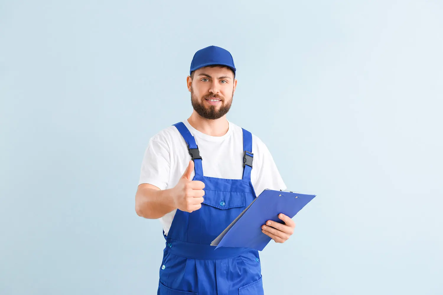 Person on the street holding their phone, looking at you